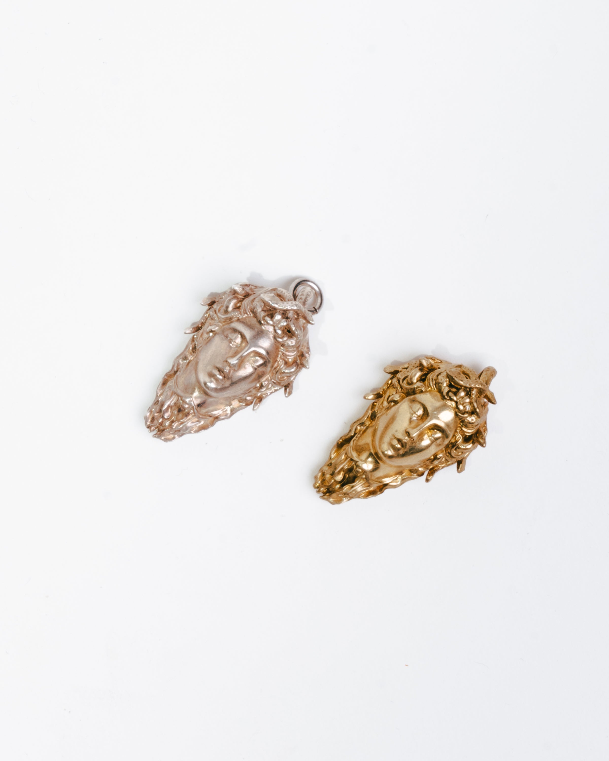 Cellini’s head earrings