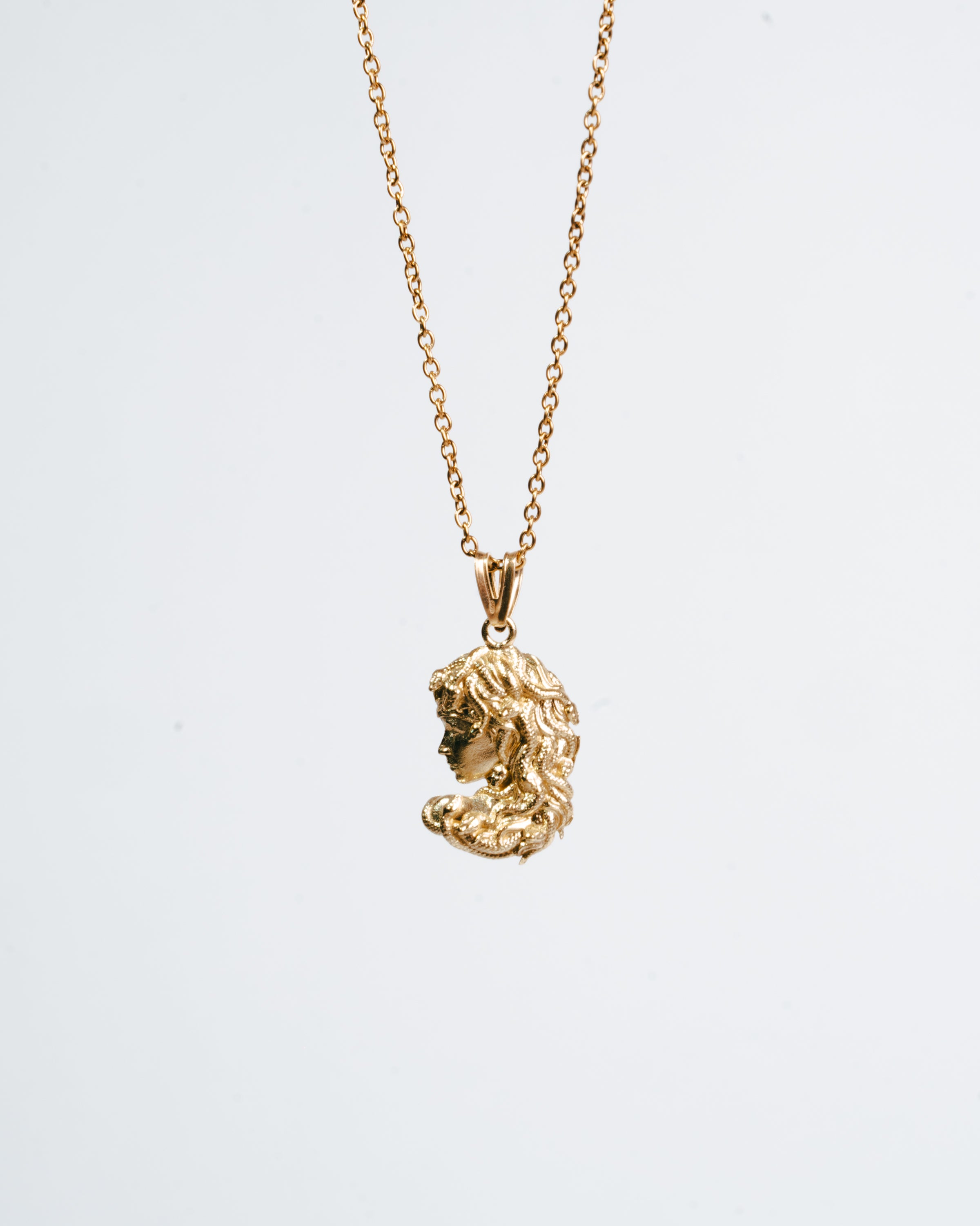 Medusa’s profile pendant