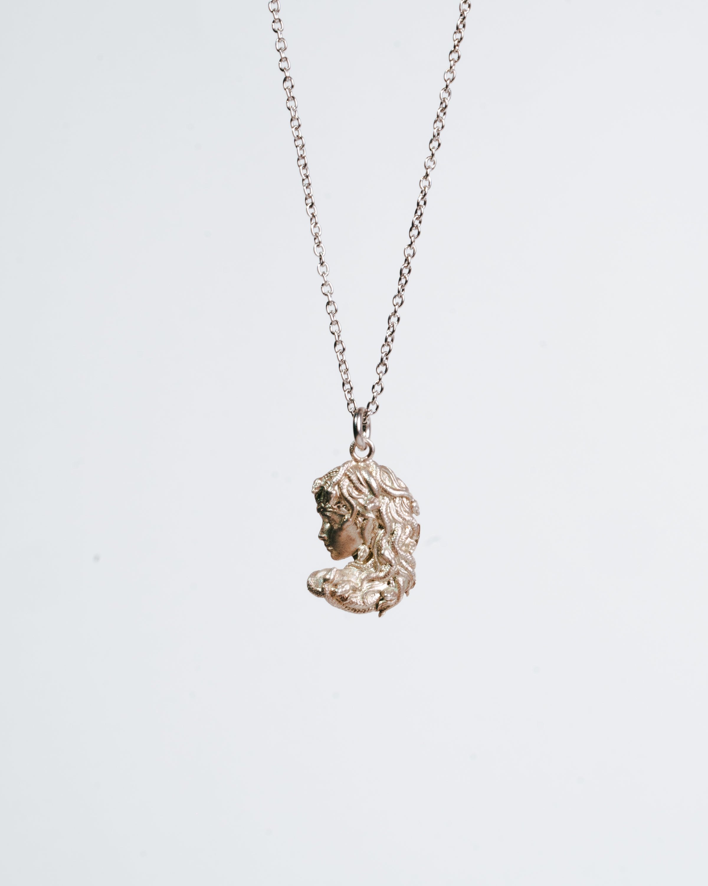 Medusa’s profile pendant