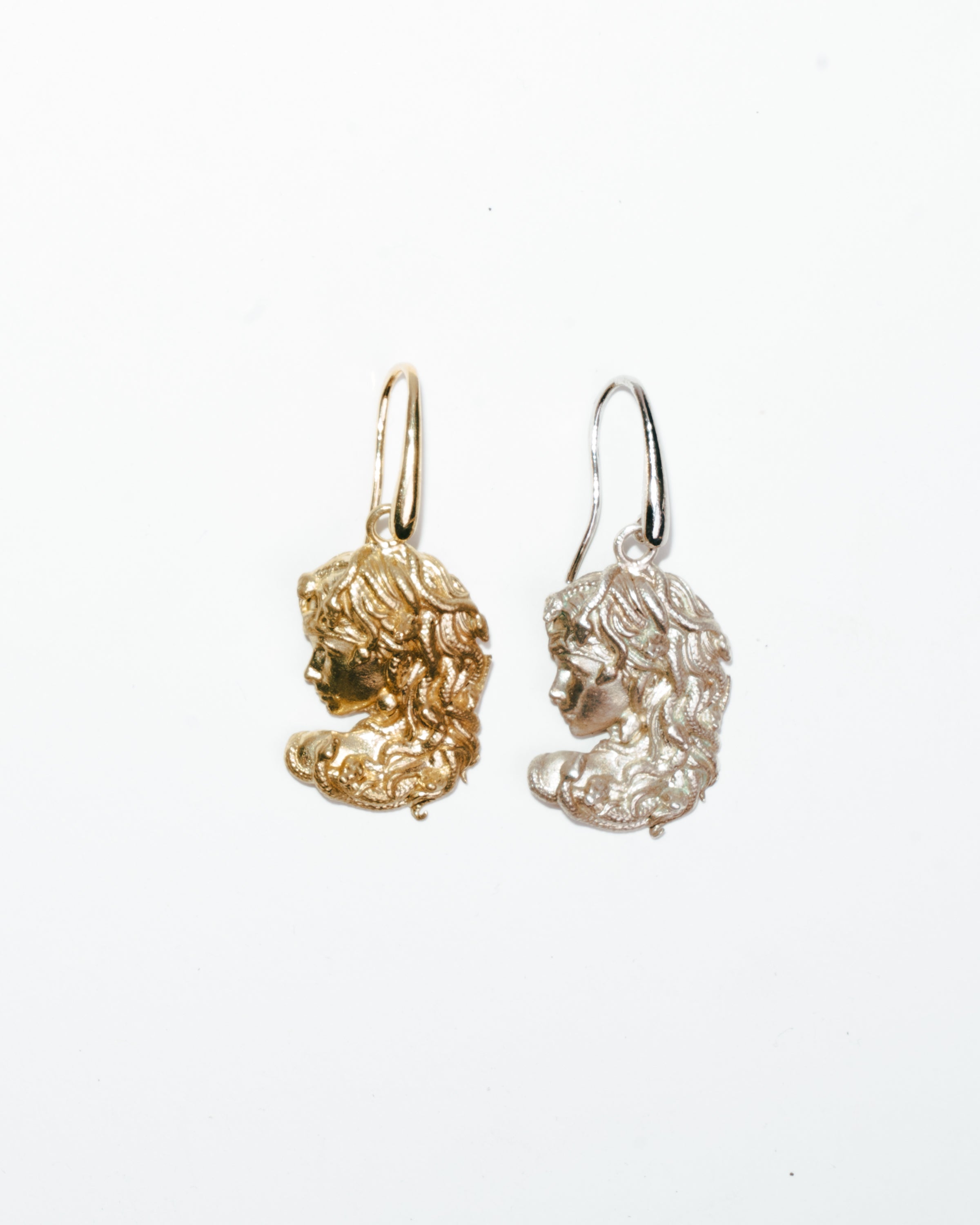 Medusa’s profile earrings